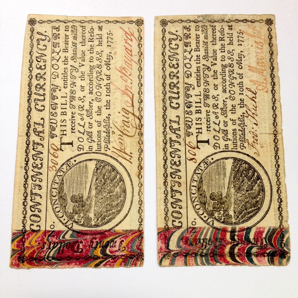 [Continental currency]. Philadelphia: 1775. This early American currency includes a strip of wide-comb marbling as an anti-counterfeiting measure.