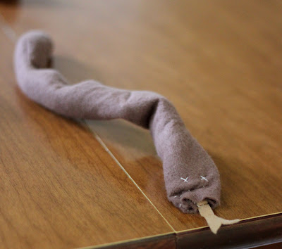 A book snake, to hold open pages